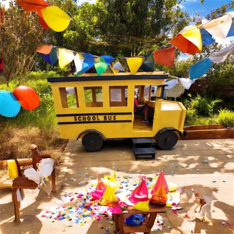 Kinzerbilt School Bus Playset built with Premium Pine at a Backyard Party with balloons and streamers.